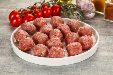 Uncooked raw beef meatball minced
