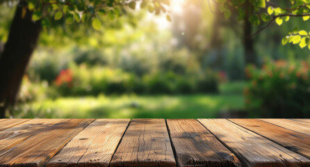 Wooden table and blurred background of the garden with trees