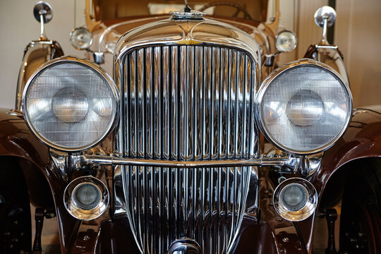 Vintage Car Chrome Grille and Emblem Close-Up
