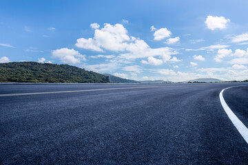 Empty asphalt road and mountains with nature background