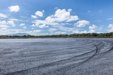 Empty asphalt road and mountains with nature background