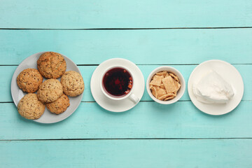 Cup of tea with cookies on the table