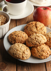cereal cookies with Cup of tea and fruits on the table