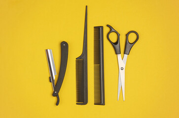 Barber working tools on a yellow background. Layout. Flat lay. Top view