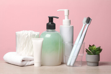 Cosmetic products ion pink background. Personal hygiene. Morning routine. Beauty concept