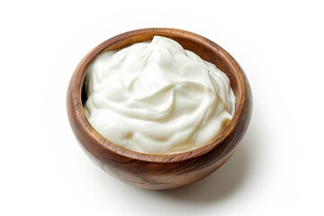 Isolated top view of a wooden bowl with sour cream or yogurt on white background