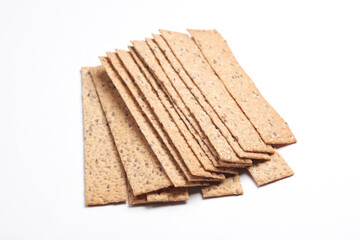 Crispy bread on white background. Close up