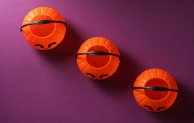 Halloween bucket on purple background