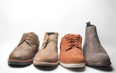 Various men's shoes on a white background