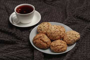Breakfast in bed. Food on a dark blanket. Top view
