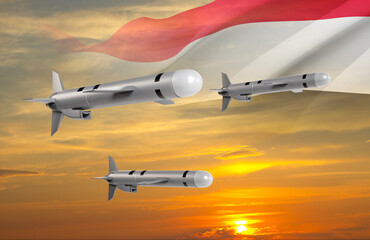 Tomahawk cruise missiles with Yemen flag against the sunset