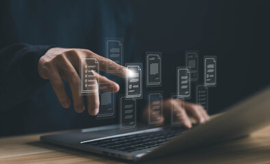 software for management recorded, businessman manages data on a laptop, document files digital...