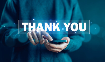 businessman using a smartphone and showing the message thank you on a display screen. concept of thank you business, congratulations, presentation from technology digital, appreciation, and gratitude 
