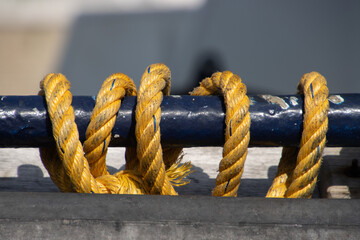 Close up of a rope slung around a pole