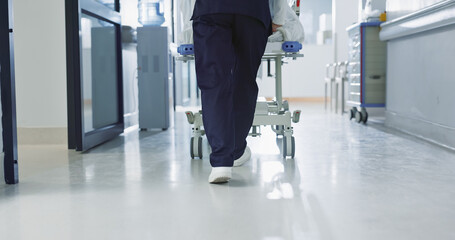 Nurse, feet and walking patient in hospital, bed or steps in hallway or corridor to surgery,...