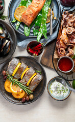 Assortment variousfish dishes - octopus, shrimp, crab, seafood, mussels, salmon.