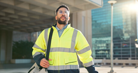 Engineer man, walking and street in city, thinking and ideas on travel to work, bag and outdoor....