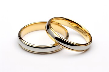 A pair of sparkling and luxurious gold rings in the photo on a white background. generative AI