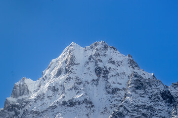 Pristine Peaks under a Clear Blue Sky.