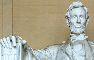 Part of the Georgia white marble statue of Abraham Lincoln sitting in his armchair with his...