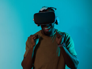 African American man immerses himself in a thrilling horror gaming experience using VR glasses,...