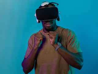 In an avant-garde scene, an African American man engages in cutting-edge virtual reality gaming,...