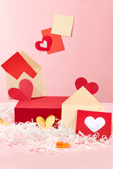 Blank podium in rectangle shaped arranged with several envelopes and gift cards. Note paper pinned...