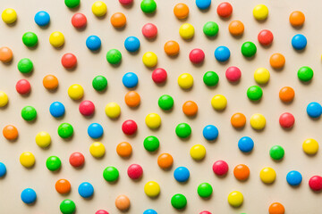 colorful candies as background top view. Seamless pattern with candy. Many sweet candies close-up