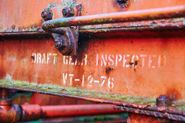 Rusty Draft Gear Close-Up with Stenciled Inspection Date, Abandoned Railyard