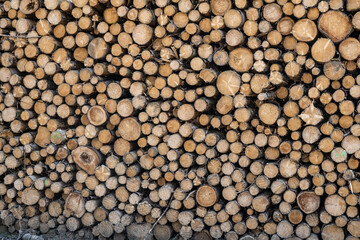 Abstract photo pile natural wood background dry chopped firewood logs ready for winter