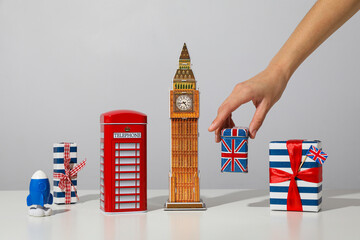 Symbols of Great Britain, Big Ben, tea box and flag.