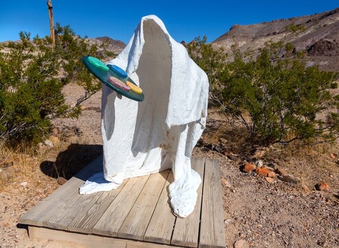 Beatty, Nevada, USA - November 10, 2023: Ghost Sculpture with Paint Palette Standing on Podium. Belgian sculptor Albert Szukalski Public Art Rhyolite Nevada Ghost Town Goldwell Open Air Museum