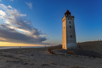 Fototapeta premium Sunset at the lighthouse Rubjerg Knude Fyr near Lokken in Denmark.