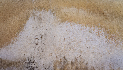 Stains on the concrete surface. Dirty cement wall background. Rough grunge backdrop.