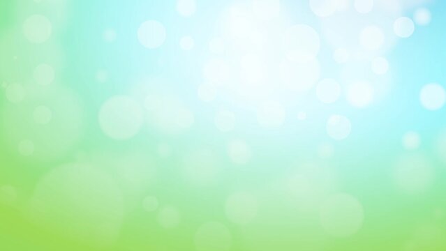 Blurred sky background with nature glowing sunlight flare and bokeh in spring green blue.