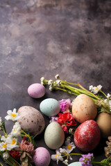 Fototapeta na wymiar Easter Background With Copy Space, A Group Of Colorful Eggs And Flowers