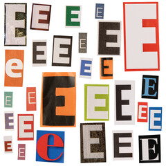 Letter E cut out from newspapers