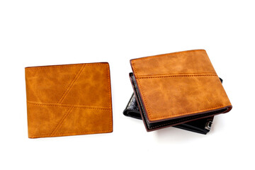 Brown wallets on white background.