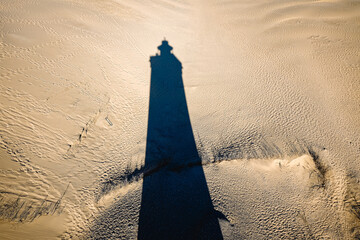 shadow of the lighthouse Rubjerg Knude Fyr on the beach of  lokken jutland denmark - obrazy, fototapety, plakaty