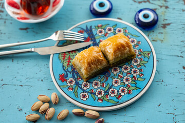 Turkish Baklava with Pistachio in Colorful Ramadan Cuisine, Traditional Ottoman Dessert Photograph,...