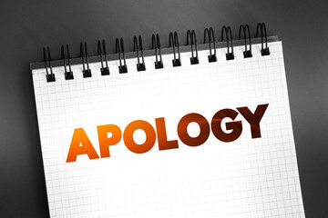 Apology text quote on notepad, concept background