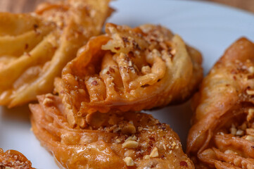Turkish baklava, sweet dessert with honey on a light plate 9