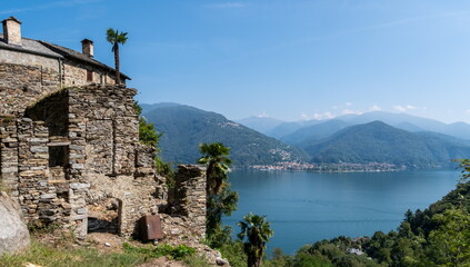 view of Lago Maggiore from a beautifully preserved medieval village Carmine Superiore. Cannobio. Italy - 718802126