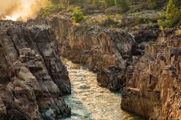 Jabalpur, Madhya Pradesh/India : October 24, 2018 – Dhuandhar waterfall in Narmada river at Bhedaghat, Jabalpur.