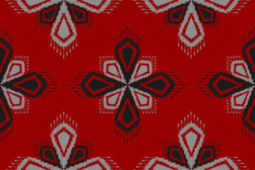 Fabric flower ikat pattern art. Ethnic red seamless pattern traditional. American, Mexican style. Design for background, illustration, clothing, carpet, rug, batik, embroidery.