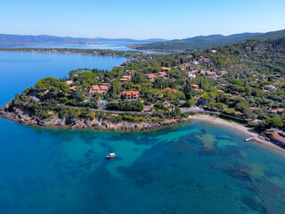 aerial view of the Argentario coast, in the background the Orbetello lagoon.