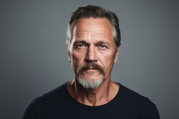 Obraz premium Portrait of a handsome mature man. Men's beauty, fashion