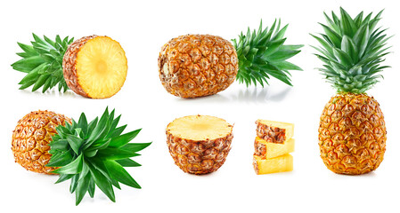 Fresh organic pineapple with leaves isolated on white background