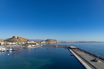 View from the sea of the beautiful coastal city of Alicante, Spain - 718824539