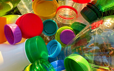 Plastic Recycling. Water bottles and plastic Bottle Caps for Recycling. Plastic recyclable and...